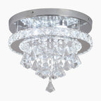 Maison Ornate Crystal Ball Chandelier with chrome base, cascading crystal prisms, and integrated LED lights.