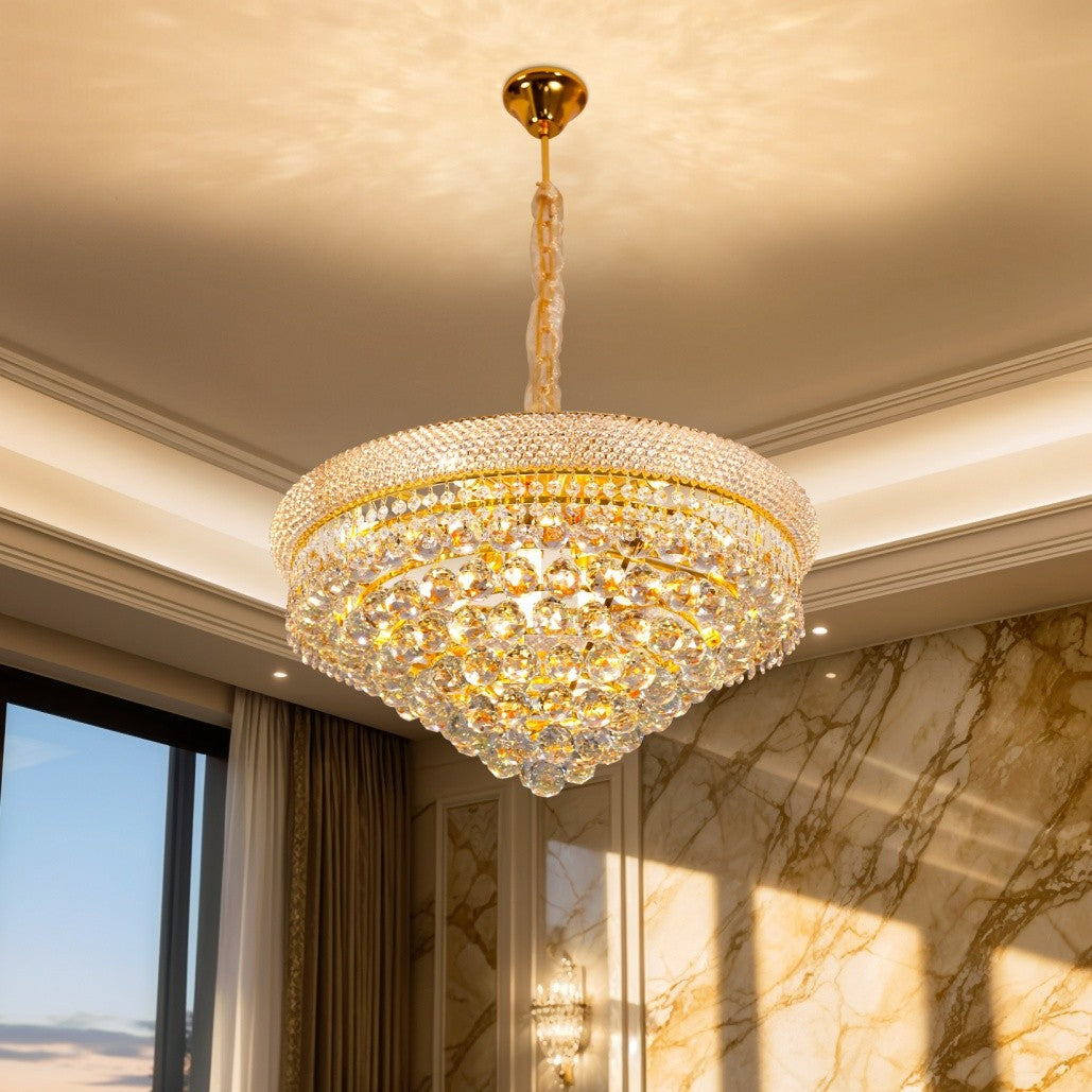 Elegant modern crystal chandelier with gold accents, adjustable height, and warm sparkling illumination.