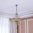 Maison Ornate K9 Crystal Chandelier with maple leaf motif and multiple arms, sparkling crystal accents.