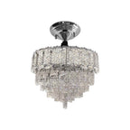 Chrome chandelier with three tiers of rectangular crystal prisms in an elegant, modern design.