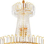 Ornate Empire-style chandelier with gold tassels, clear crystal prisms, and intricate detailing.