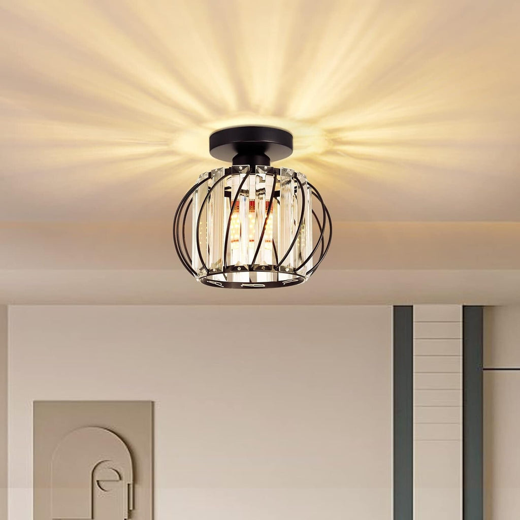 Maison Ornate Black Metal Crystal Mini Pendant with modern cage design and starburst light pattern.