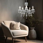 Maison Ornate Elegant Five-Arm Crystal Chandelier with chrome finish, suspended and beautifully illuminated.