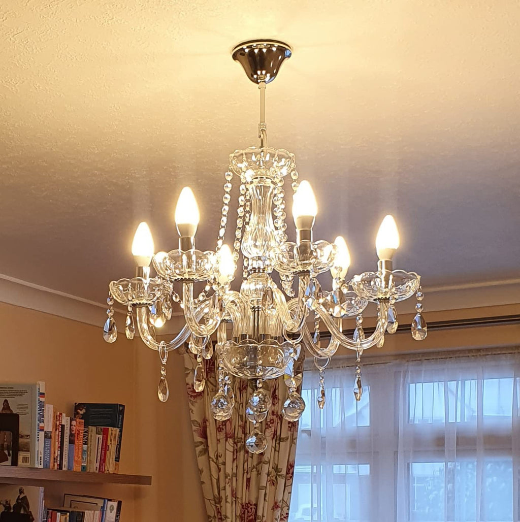 Maison Ornate Crystal Chandelier with chrome frame and K9 beads, eight bulbs, sparkling display.