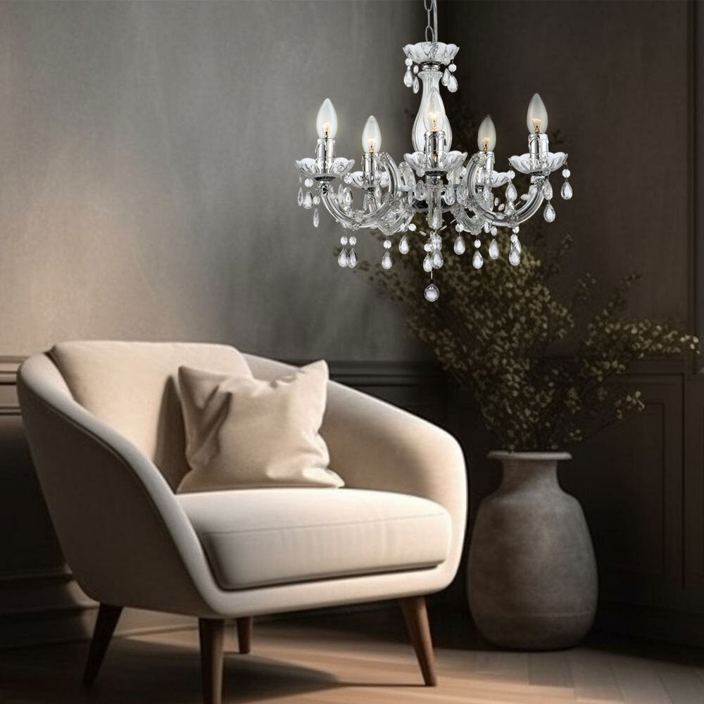 Maison Ornate Elegant Crystal Pendant Light for Dining Room Chrome, sparkling chandelier with intricate crystal details.