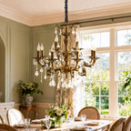 Elegant Maison ornate gold chandelier with multiple arms and crystals in modern, sophisticated style.