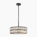 Modern black metal chandelier with two rows of faceted crystal panels and industrial design.
