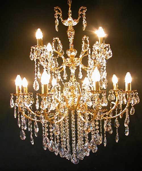Multi-arm crystal chandelier with candle-style bulbs and gold accents, exuding elegant, warm illumination.