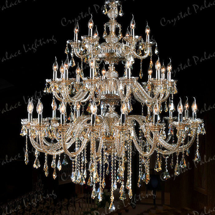 Maison Ornate K9 Crystal Champagne Multi-Arm Chandelier with candle bulbs, multi-tiers, and sparkling crystal adornments.