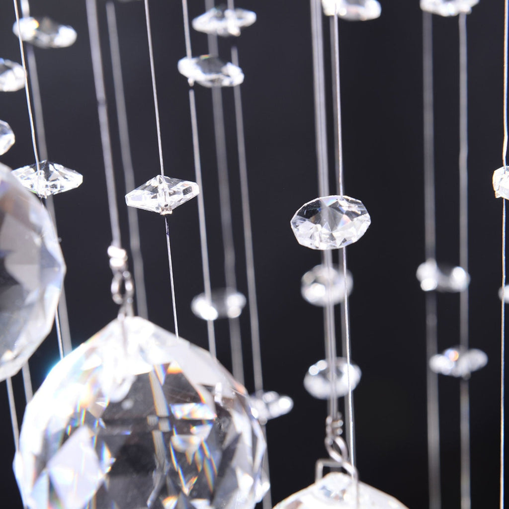 Close-up of Maison Ornate Crystal Ball Chandelier with chrome spiral, crystal beads, and pendants sparkling.