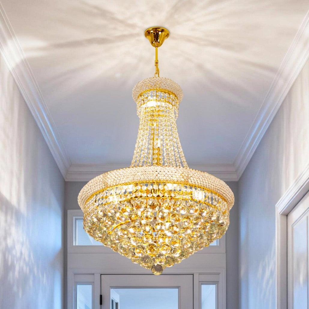 Maison Ornate Empire Style chandelier features gold accents and crystals in an elegant, intricate design.