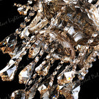 Close-up of Maison Ornate K9 Crystal Champagne Chandelier, featuring intricate glasswork and sparkling faceted crystal pendants.