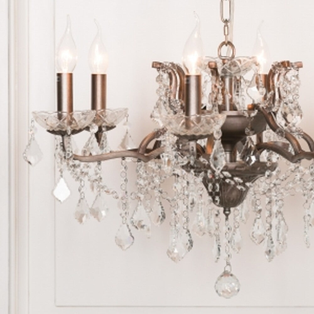 Maison Ornate French Style Chandelier with six silver glass arms and hanging crystal pendants.