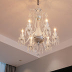 Maison Ornate Crystal Chandelier with 6/8/10 clear arms, lit bulbs, luxurious glass details.