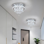 Two Maison Ornate Crystal Ball Chandeliers with LED, contemporary design, suspended from a white ceiling.