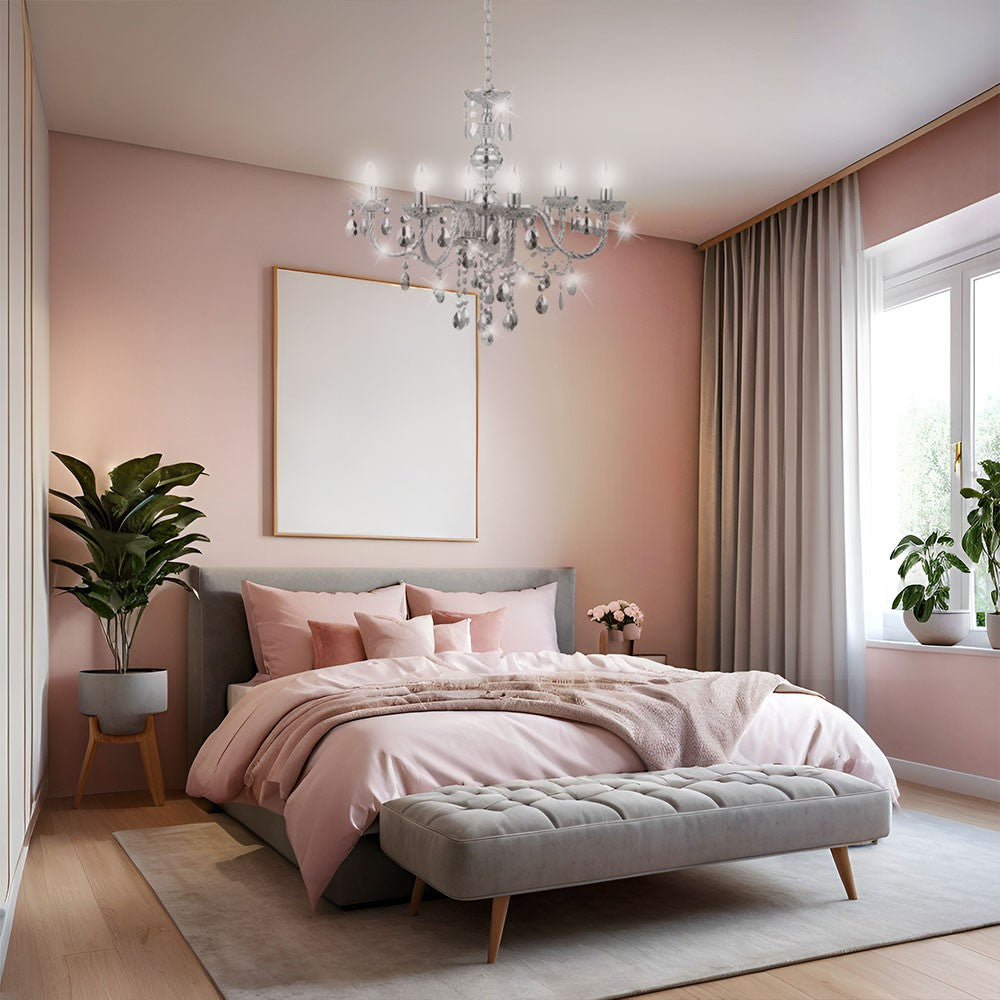Maison Ornate LED Crystal Chandelier in chrome with remote, elegant modern lighting fixture suspended above.
