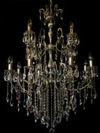 Maison Ornate Modern Crystal Lustre: gold geometric chandelier with candle bulbs and glass droplets.