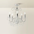 Maison Ornate Chrome Crystal Chandelier with five candle-style LED bulbs, chrome arms, and hanging crystals.