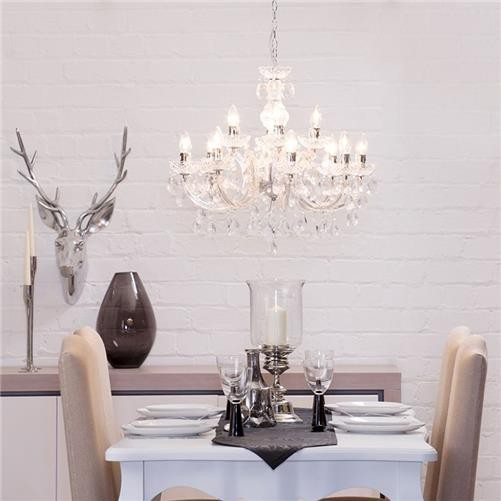 Maison Ornate Art Deco crystal chandelier with chrome arms, intricate details, and sparkling crystal accents.