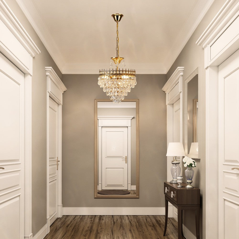 Maison Ornate's Crystal Chandelier, elegant and modern, sparkles with refined gold details.