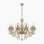 Maison Ornate Crystal Chandelier with 10 arms, intricate curves, metal frame, sparkling crystal accents.