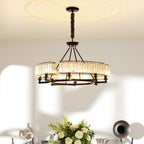 The Maison Ornate Black Metal Multi-Pendant Chandelier with crystals and warm illumination overhead.