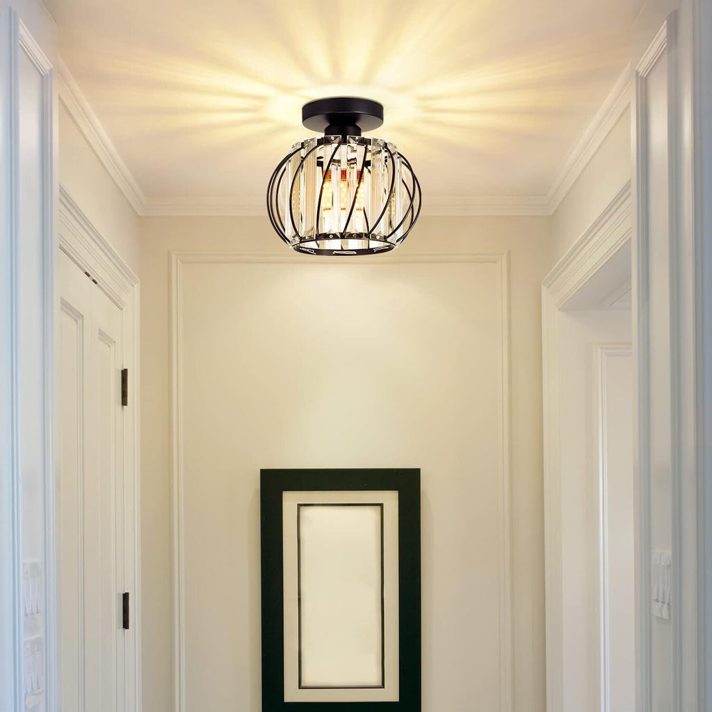 Maison Ornate Black Metal Crystal Industrial Mini Pendant chandelier with decorative light patterns.