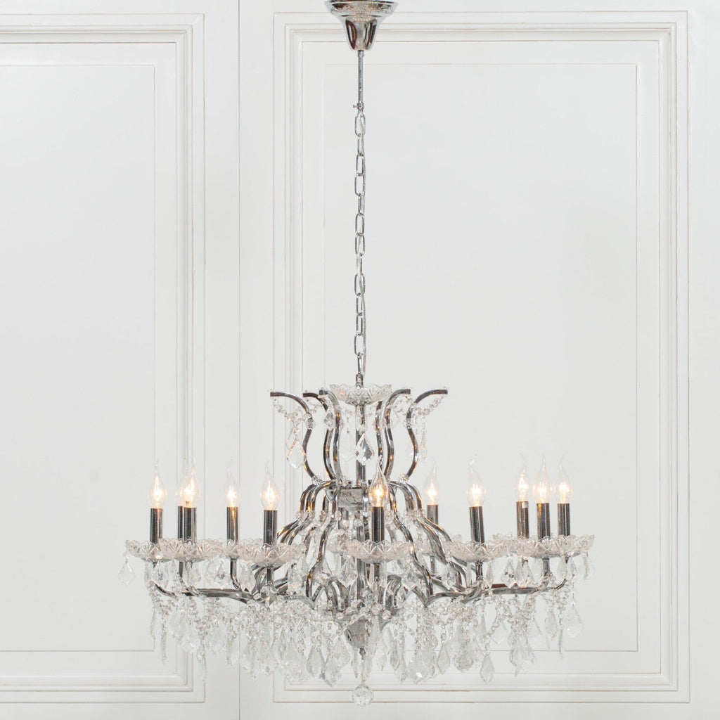 Maison Ornate French Chrome Crystal Chandelier with 12 arms, candle bulbs, chrome accents, and cut glass ornaments.