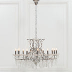 Maison Ornate French Chrome Crystal Chandelier with 12 arms, candle bulbs, chrome accents, and cut glass ornaments.