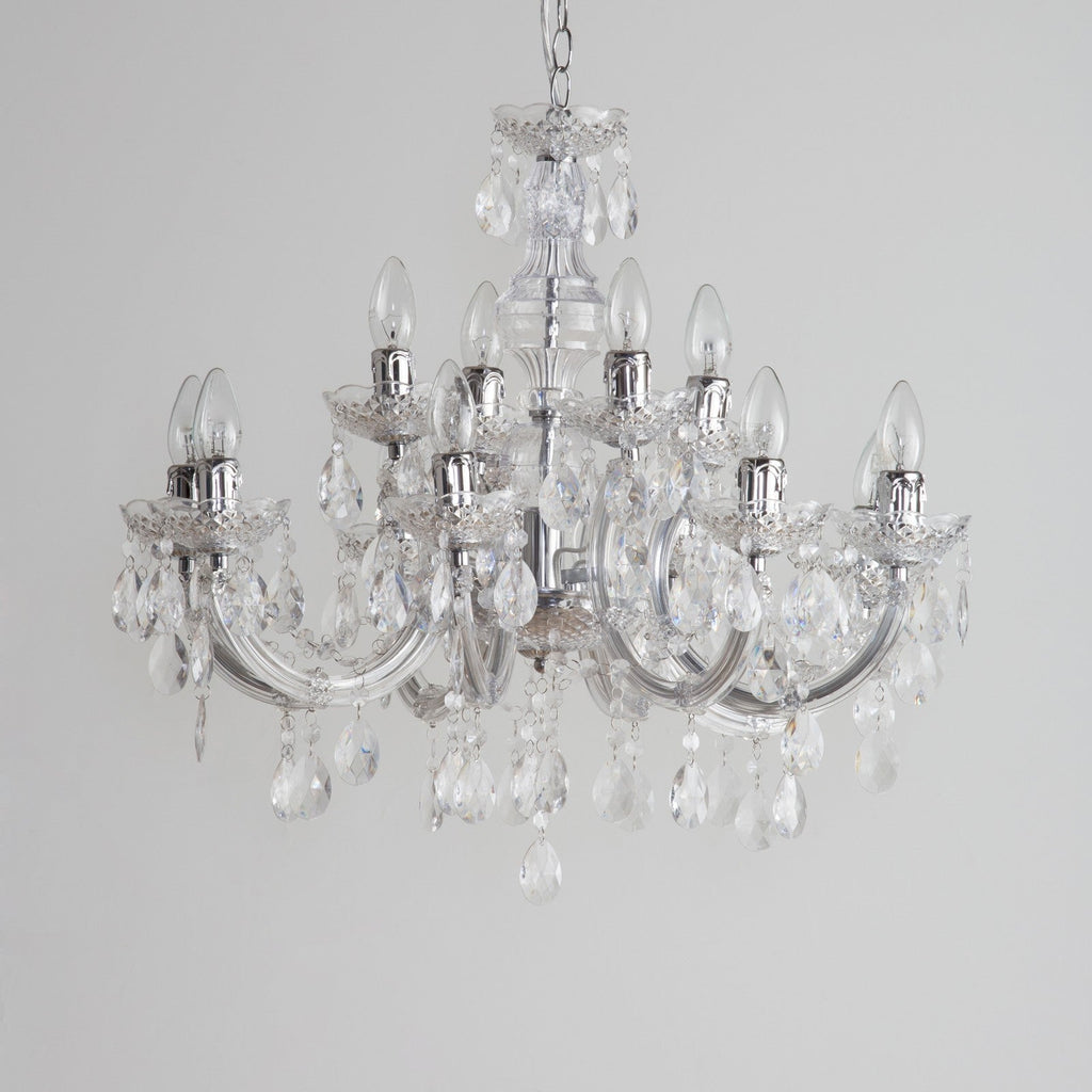 Maison Ornate Art Deco crystal chandelier with chrome arms, candle bulbs, and hanging droplets.