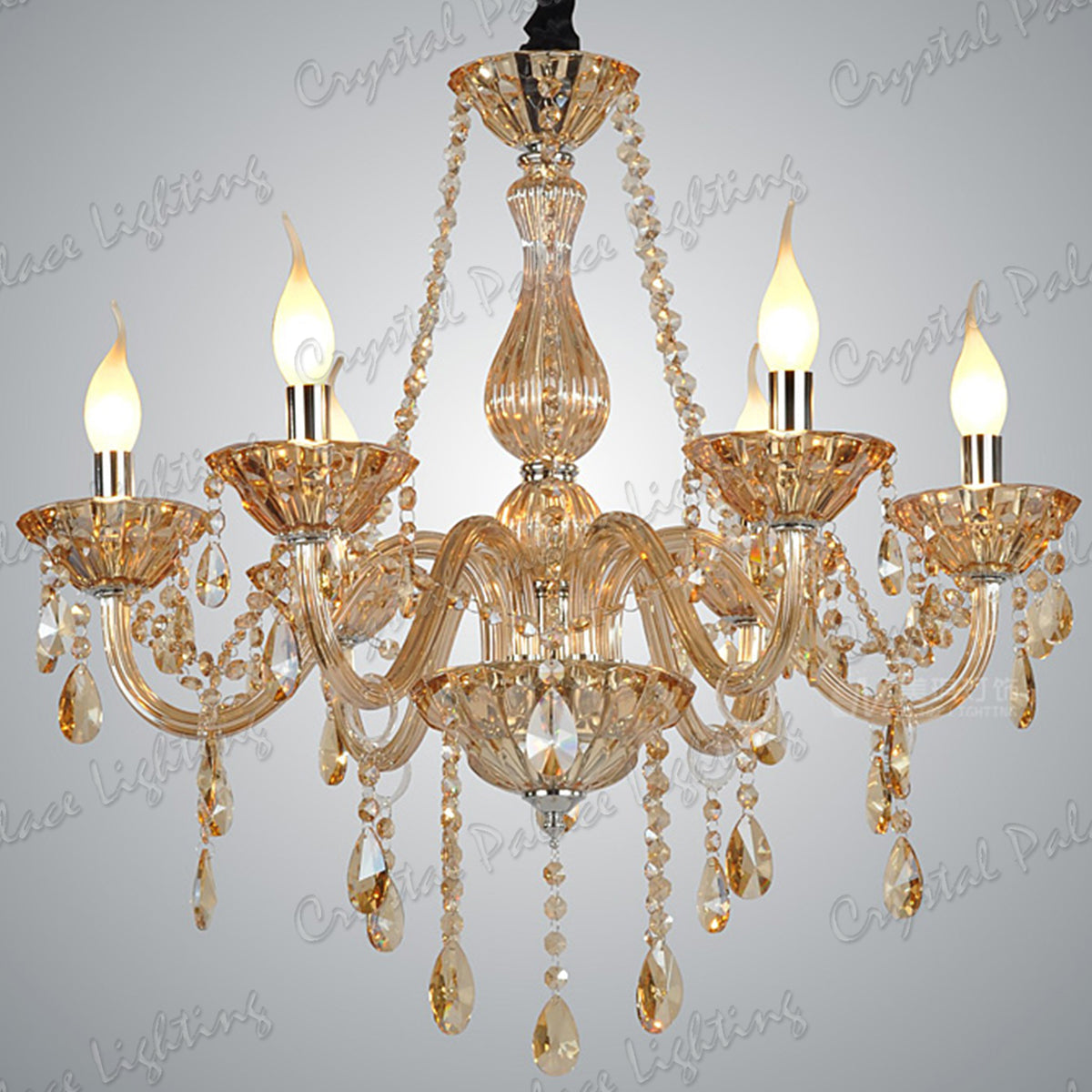 Maison Ornate Elegant K9 Crystal Gold Chandelier with glass arms and teardrop pendants, E14 candle lights.