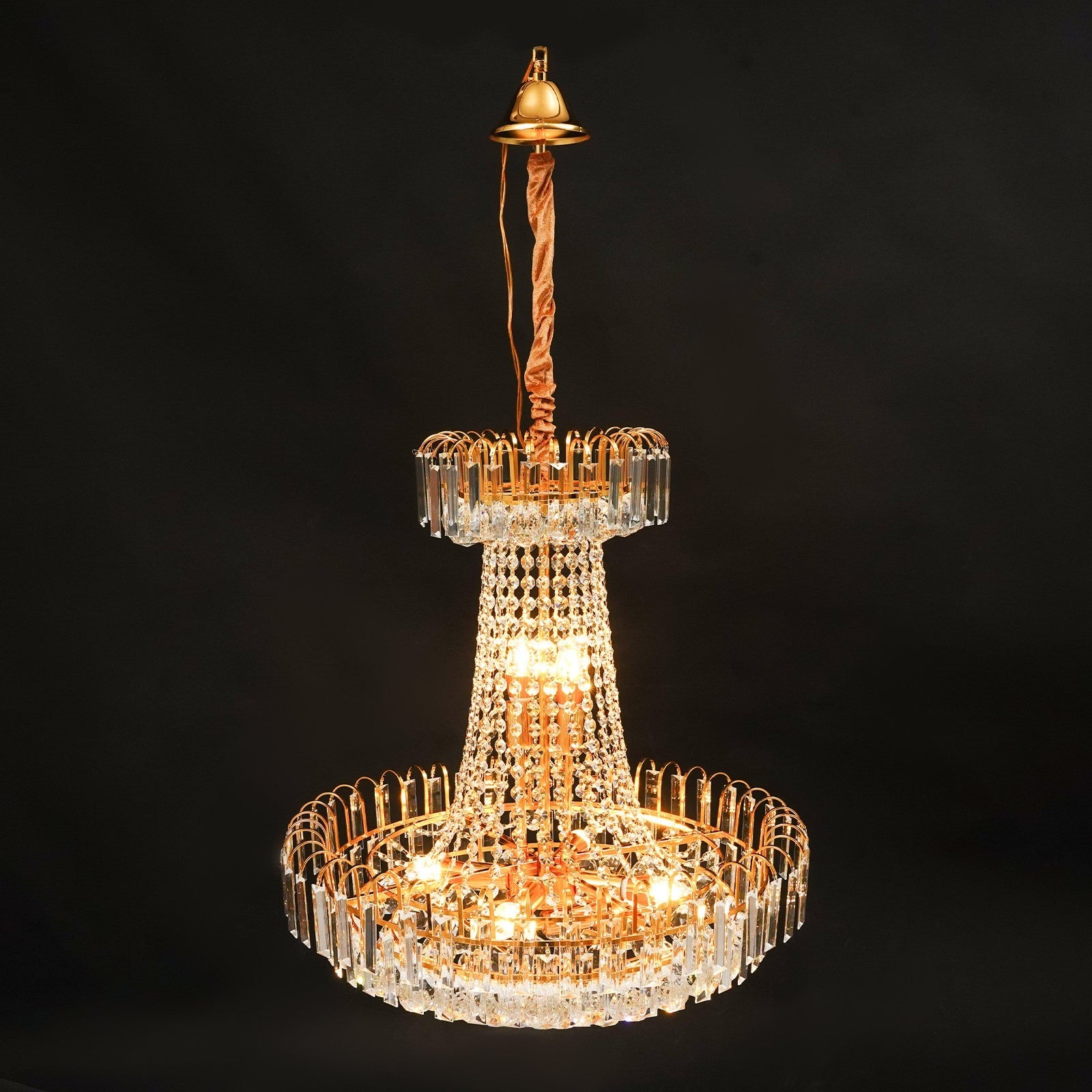 Empire Style Gold Tassel Crystal Chandelier by Maison Ornate with sparkling prisms and warm lights.