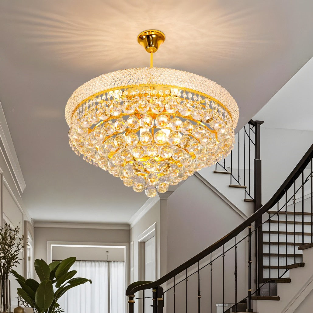 Maison Ornate Elegant Empire Style chandelier with gold finish and crystal details, providing warm illumination.