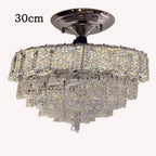 Chrome Crystal Industrial Chandelier with three prism tiers, metallic base, sparkling 30 cm design.