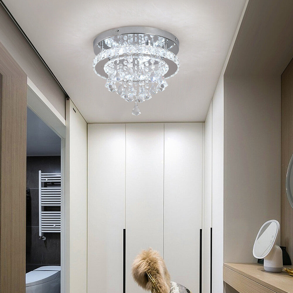Maison Ornate's Crystal Ball Chandelier with LED Contemporary Design hanging in a modern hallway.