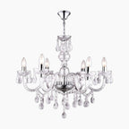 Maison Ornate Crystal Chandelier with chrome frame, silver tassels, glass arms, and sparkling pendants.